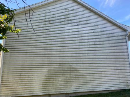 How traverse citys lake effect humidity causes siding oxidation and how to fix it