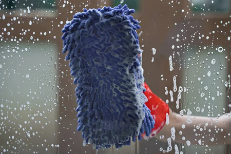Suttons bay window cleaning how to keep lakeside glass spotless year round