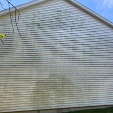 How Traverse City’s Lake-Effect Humidity Causes Siding Oxidation (And How to Fix It)